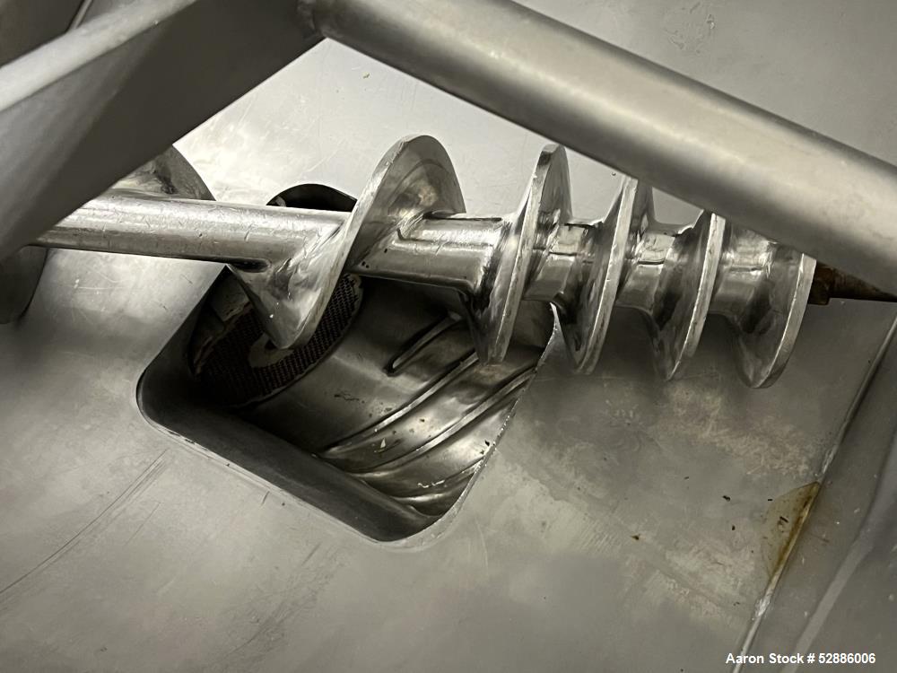 Used Hollymatic Mixer Grinder, Model 180A , 304 Stainless Steel construction. 225lbs Capacity hopper, #52 grinder head. Approximate 23-3/4" wide x 20" long x 26" deep trough, with top hinged cover. A...