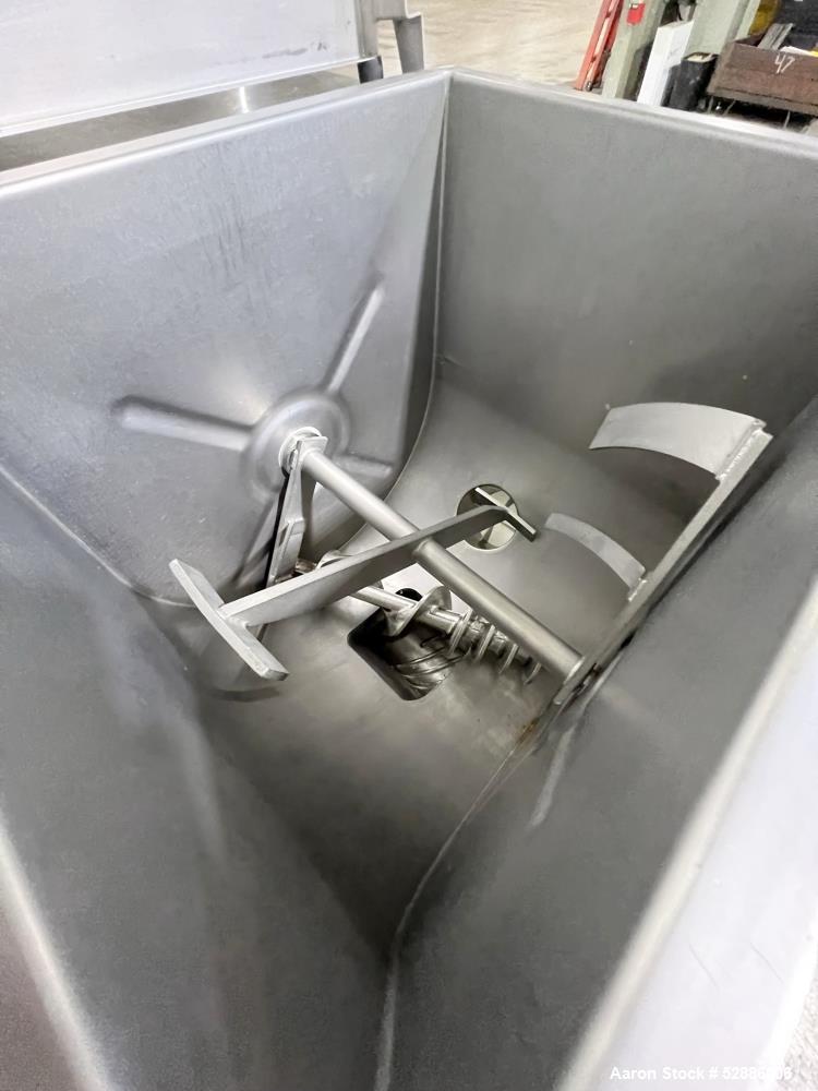 Used Hollymatic Mixer Grinder, Model 180A , 304 Stainless Steel construction. 225lbs Capacity hopper, #52 grinder head. Approximate 23-3/4" wide x 20" long x 26" deep trough, with top hinged cover. A...