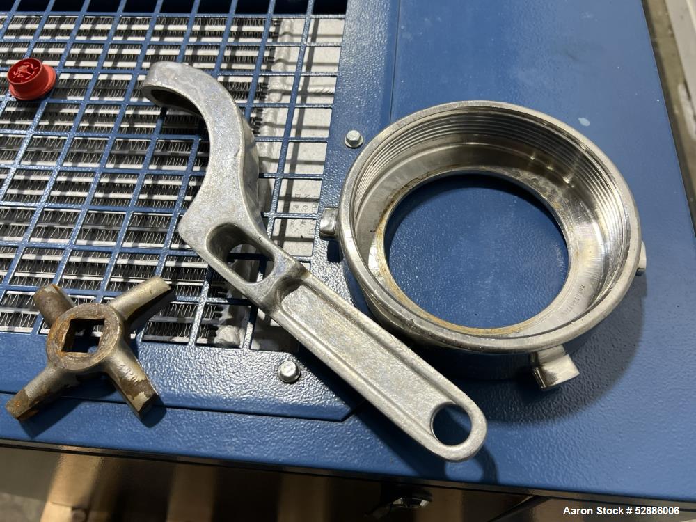 Used Hollymatic Mixer Grinder, Model 180A , 304 Stainless Steel construction. 225lbs Capacity hopper, #52 grinder head. Approximate 23-3/4" wide x 20" long x 26" deep trough, with top hinged cover. A...