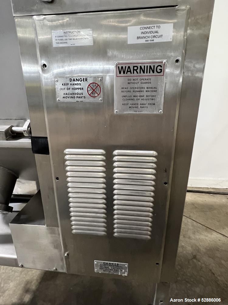 Used Hollymatic Mixer Grinder, Model 180A , 304 Stainless Steel construction. 225lbs Capacity hopper, #52 grinder head. Approximate 23-3/4" wide x 20" long x 26" deep trough, with top hinged cover. A...