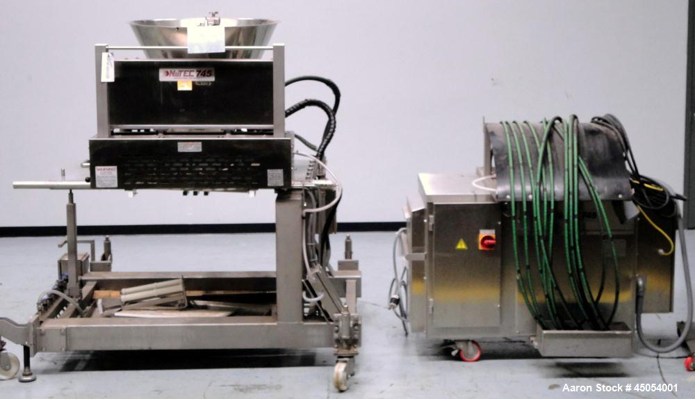 Used NuTEC Manufacturing Hydraulic Provatec 745 Patty Forming Machine. Approximately 15 to 65 strokes per minute, varies on portion size. Has hopper capacity of 400 pounds, usable mold plate area 16"...