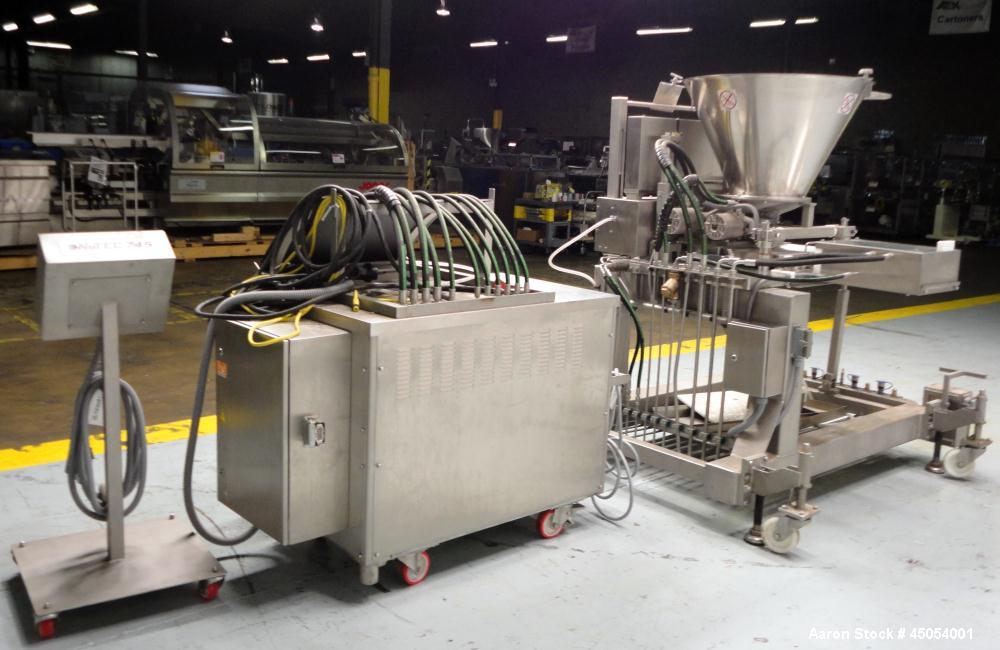 Used NuTEC Manufacturing Hydraulic Provatec 745 Patty Forming Machine. Approximately 15 to 65 strokes per minute, varies on portion size. Has hopper capacity of 400 pounds, usable mold plate area 16"...