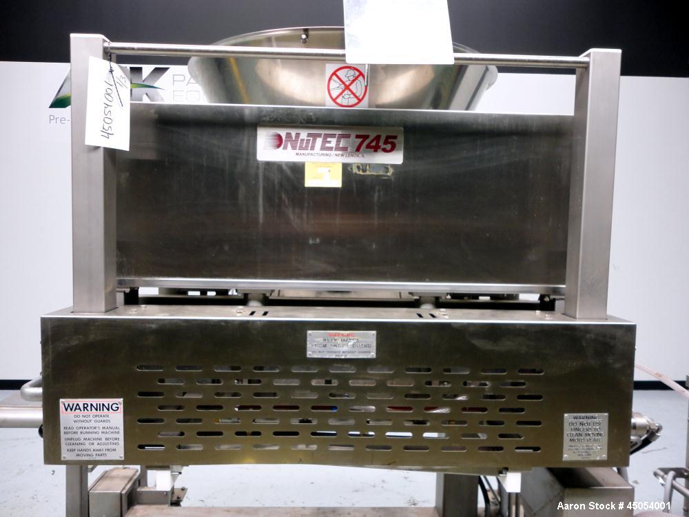 Used NuTEC Manufacturing Hydraulic Provatec 745 Patty Forming Machine. Approximately 15 to 65 strokes per minute, varies on portion size. Has hopper capacity of 400 pounds, usable mold plate area 16"...