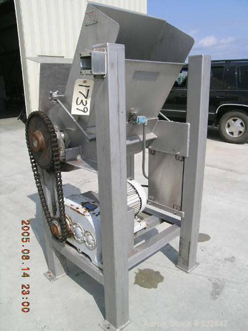 USED: Rotoclaw II frozen meat flaker, model C-299. Handles frozenblocks of meat up to 9.5" thick and 21" wide. Production rates varyfrom 6,000-15,000 lbs/hour depending on desired chunk size. Medorsp...
