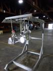 Used- 3 Up Water Wheel. Mounted on Portable Stainless Steel Cart.