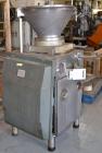 Used Handtmann Vacuum Filler, Model VF10-50, Code 65/25, Carbon steel. Top feed hopper with mixing arm, driven by a 0.55kw, 3/60/200 volt, 1700 rpm motor. Removable vane feeder driven by a 1.5/4.4kw,...