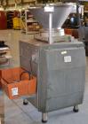 Used Handtmann Vacuum Filler, Model VF10-50, Code 65/25, Carbon steel. Top feed hopper with mixing arm, driven by a 0.55kw, 3/60/200 volt, 1700 rpm motor. Removable vane feeder driven by a 1.5/4.4kw,...