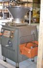 Used Handtmann Vacuum Filler, Model VF10-50, Code 65/25, Carbon steel. Top feed hopper with mixing arm, driven by a 0.55kw, 3/60/200 volt, 1700 rpm motor. Removable vane feeder driven by a 1.5/4.4kw,...