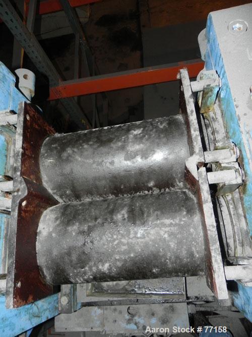 Used Horizontal Two Roll Mill. 8" Diameter x 18" long chrome plated cored rolls. Adjustable end guides, approximate distance between 14-1/4". Manual roll adjustments. Minimum roll gap is contact and ...