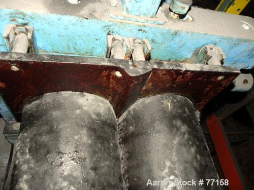 Used Horizontal Two Roll Mill. 8" Diameter x 18" long chrome plated cored rolls. Adjustable end guides, approximate distance between 14-1/4". Manual roll adjustments. Minimum roll gap is contact and ...