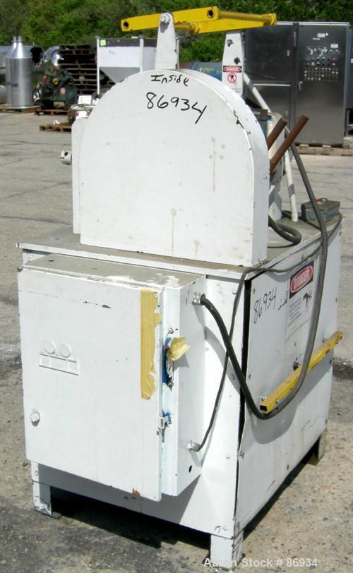 USED: Horizontal Two Roll Mill. (2) 6" diameter x 13" wide chrome plated cored rolls. (2) Knee safeties, (1) knife scraper. Manual roll adjustment. Driven by a 1 HP, 3/60/220/440 Volt, 900 RPM US var...