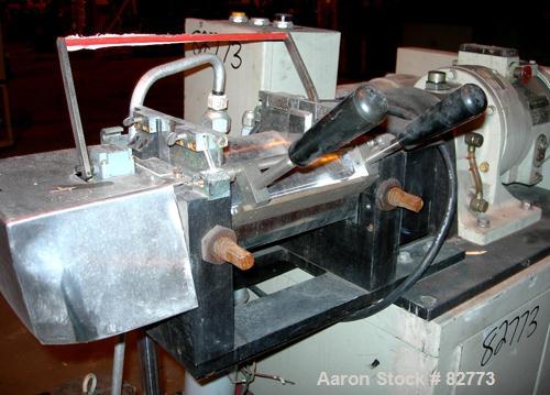 USED: C W Brabender horizontal two roll prep mill, model PM2000. (2) 4" diameter x 8" wide chrome plated cored rolls. Operating volume approx 250 ml. Adjustable end guides, (1) knee safety, (1) knife...
