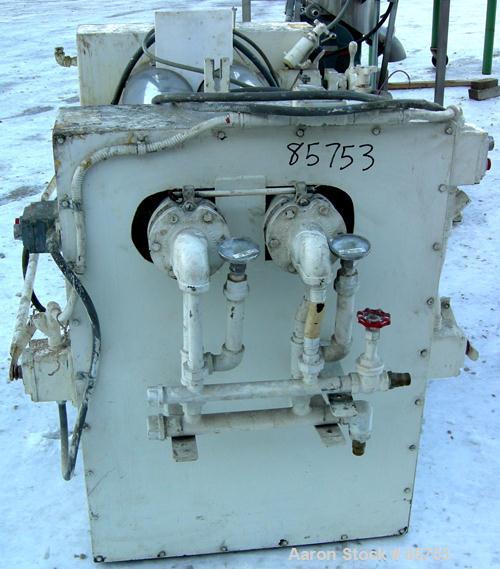 Used Ross Horizontal Two Roll Mill, Model 9X24. (2) 9" diameter x 24" wide chrome plated cored rolls, (1) roll cracked. Adjustable end guides, (2) knee safeties, bottom drip pan. Manual roll adjustme...