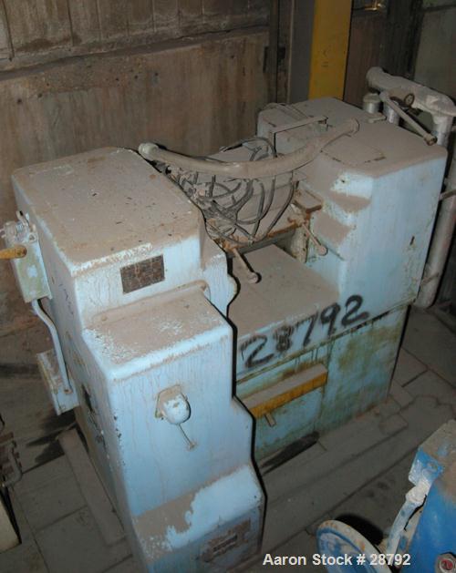 USED: Farrel 6" x 13" horizontal two roll mill. Chrome plated cored rolls 1.4:1 friction ratio. Fixed end guides overhead and knee safeties. Hand micro adjustments. Bottom mill pan, doctor blades. 7....