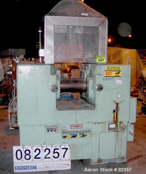 USED: Farrel horizontal two roll mill. (2) 8" diameter x 16" wide cored rolls, temp range approximately 350 deg F. Adjustable end guides, (2) knee safties, (1) swinging knife scraper, bottom drip pan...