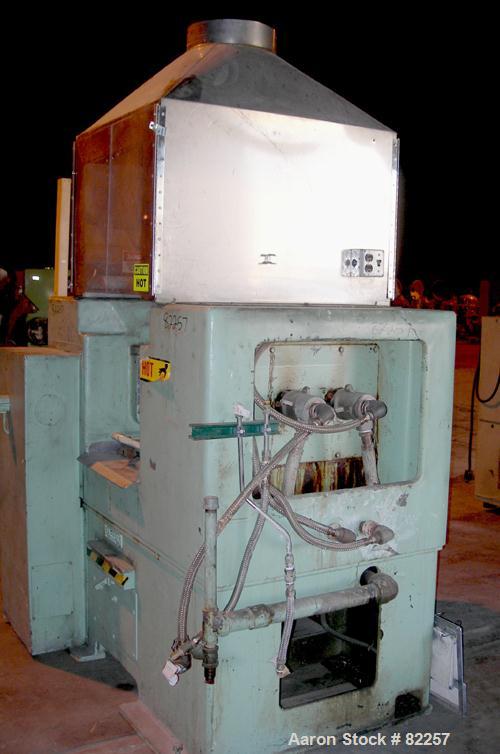 USED: Farrel horizontal two roll mill. (2) 8" diameter x 16" wide cored rolls, temp range approximately 350 deg F. Adjustable end guides, (2) knee safties, (1) swinging knife scraper, bottom drip pan...