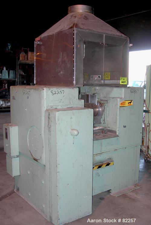 USED: Farrel horizontal two roll mill. (2) 8" diameter x 16" wide cored rolls, temp range approximately 350 deg F. Adjustable end guides, (2) knee safties, (1) swinging knife scraper, bottom drip pan...