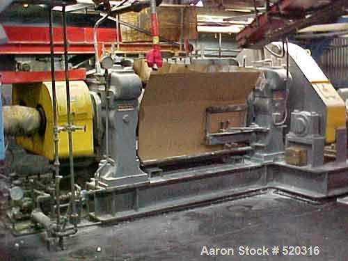 USED: Farrell unitized 2 roll mill 22" x 22" x 60". Herringbonebull gear and pinion drive. Top cap frame design, sleeve bearings.Mfg 1966. Has 1.25:1 friction ratio, rotary unions to each roll,manual...