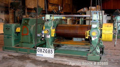 USED: Farrell horizontal two roll mill, (2) 22" diameter x 60" wide iron cored rolls. Operating temp approximately 200 deg F, adjustable end guides, bottom drip pan, manual roll adjustment, 75-125 po...