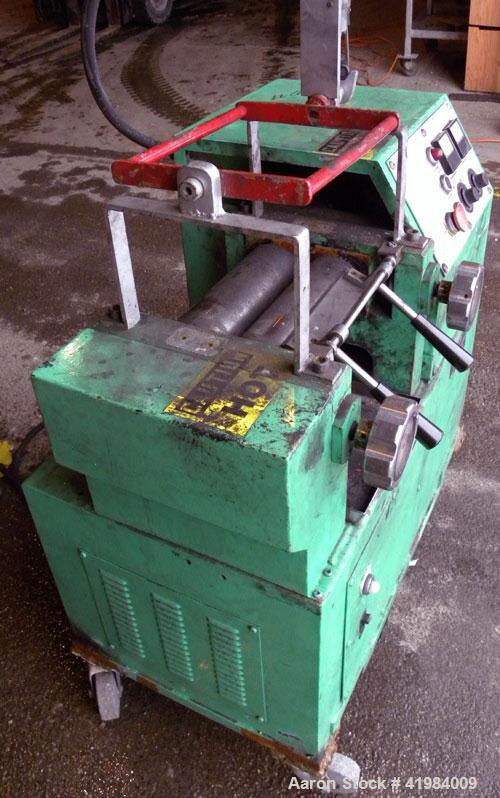 Used Nishimura Horizontal Two Roll Mill. (2) 3-1/2" diameter x 10" wide chrome plated rolls, manually adjustable. (1) Overhead safety, knife scraper with drip pan. Rolls driven by a 1.5 kw (2 hp), 3/...