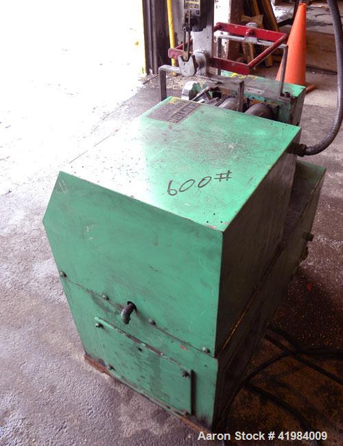 Used Nishimura Horizontal Two Roll Mill. (2) 3-1/2" diameter x 10" wide chrome plated rolls, manually adjustable. (1) Overhead safety, knife scraper with drip pan. Rolls driven by a 1.5 kw (2 hp), 3/...