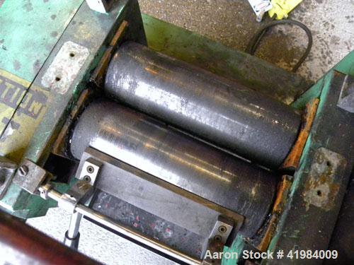 Used Nishimura Horizontal Two Roll Mill. (2) 3-1/2" diameter x 10" wide chrome plated rolls, manually adjustable. (1) Overhead safety, knife scraper with drip pan. Rolls driven by a 1.5 kw (2 hp), 3/...