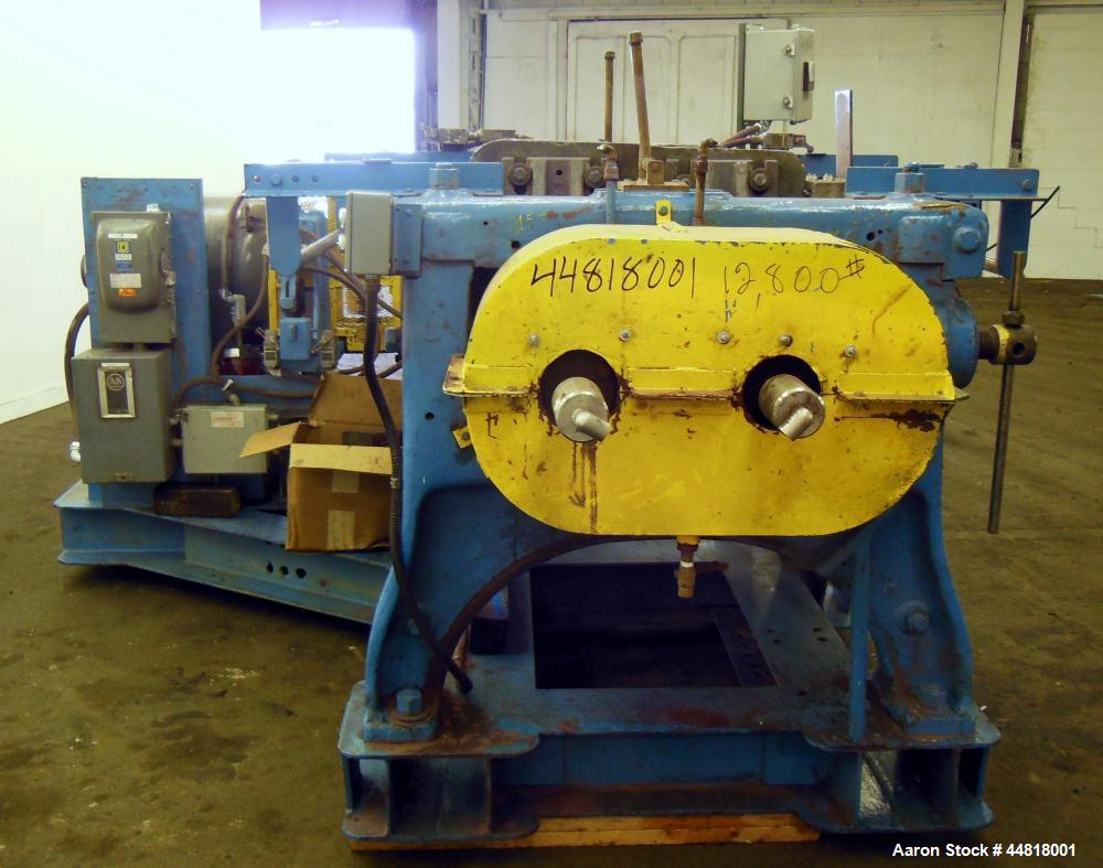 Used Reliable Rubber & Plastic Machinery Horizontal Two Roll Mill.  (2) 12" Diameter x 30" wide chromed plated cored rolls.  Knife scraper, bottom drip pan edge guides.  Manual roll adjustment.  Driv...
