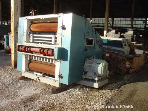 USED: Buhler Miag malt mill, type DBZA-12300X. Built 1989. 6 rollers,high capacity. Mill is totally enclosed with large doors for easyaccess. Rolls are engaged and disengaged by air cylinders. Metals...