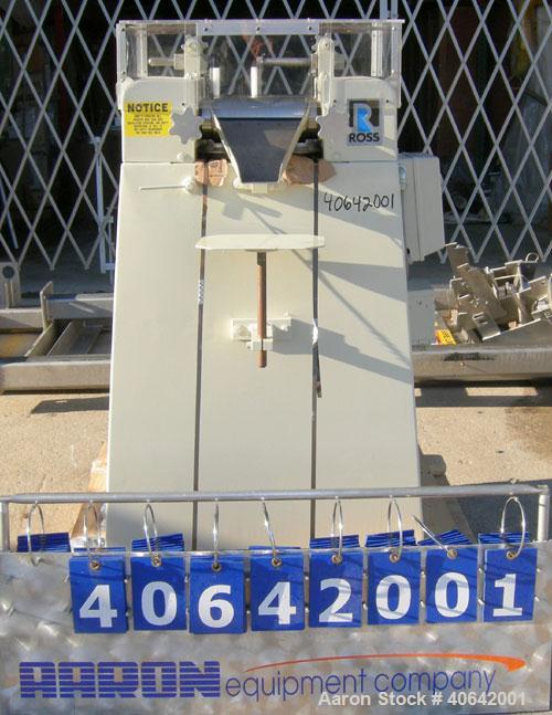 Used Ross horizontal three roll mill, model 4 X 8 TRM. (3) 4" diameter x 8" wide cored carbon steel rolls. Handwheel adjustments. Front roll speed 270 rpm. Adjustable end guides, knife scraper with d...