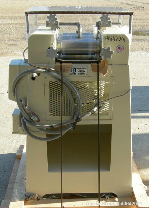 Used Ross horizontal three roll mill, model 4 X 8 TRM. (3) 4" diameter x 8" wide cored carbon steel rolls. Handwheel adjustments. Front roll speed 270 rpm. Adjustable end guides, knife scraper with d...
