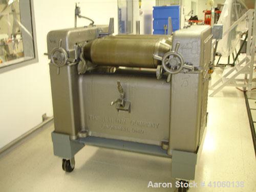 Used J.H. Day Horizontal Three Roll Mill, Model 10 x 22. (3) 10" diameter x 22" wide cored rolls. Knife scraper with discharge pan, bottom drip pan. Manual roll adjustment. Roll speed apron 300 rpm, ...