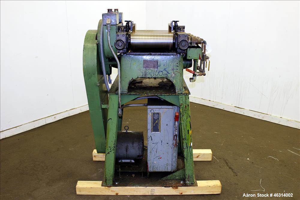 Used J.H. Day Horizontal Three Roll Lab Dispersion Mill, Model 5" x 12". (3) 5" Diameter x 12" wide carbon steel cored rolls. (2) Adjustable copper edge guides, bottom drip pan, knife scraper with di...