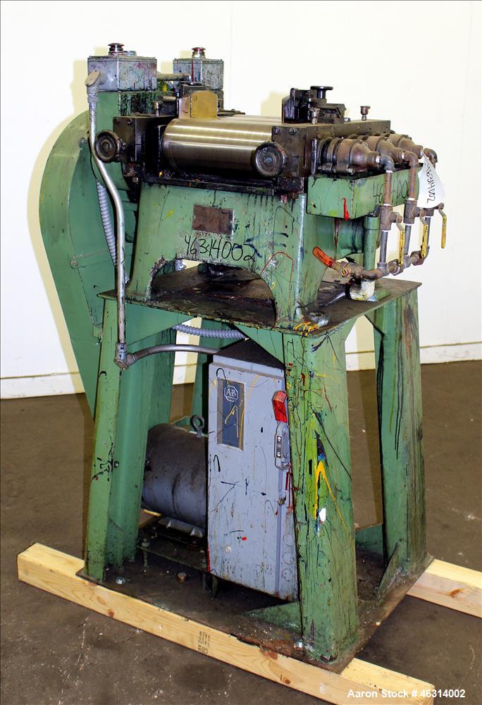Used J.H. Day Horizontal Three Roll Lab Dispersion Mill, Model 5" x 12". (3) 5" Diameter x 12" wide carbon steel cored rolls. (2) Adjustable copper edge guides, bottom drip pan, knife scraper with di...