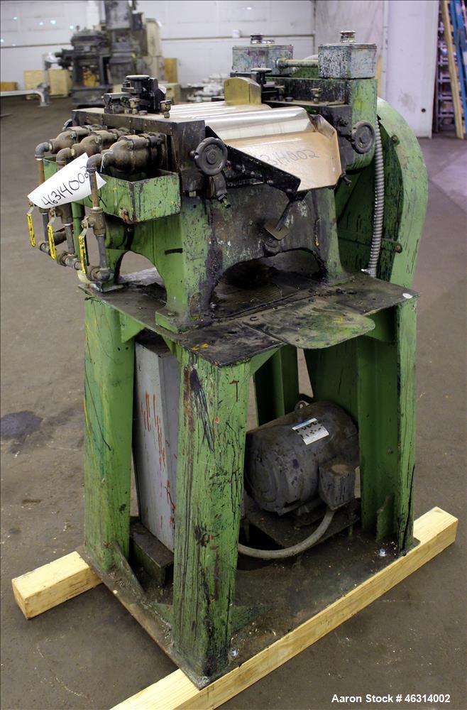 Used J.H. Day Horizontal Three Roll Lab Dispersion Mill, Model 5" x 12". (3) 5" Diameter x 12" wide carbon steel cored rolls. (2) Adjustable copper edge guides, bottom drip pan, knife scraper with di...
