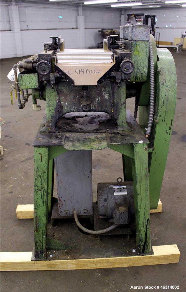 Used J.H. Day Horizontal Three Roll Lab Dispersion Mill, Model 5" x 12". (3) 5" Diameter x 12" wide carbon steel cored rolls. (2) Adjustable copper edge guides, bottom drip pan, knife scraper with di...