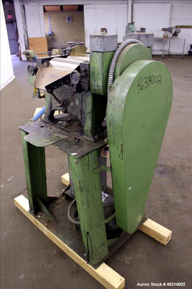 Used J.H. Day Horizontal Three Roll Lab Dispersion Mill, Model 5" x 12". (3) 5" Diameter x 12" wide carbon steel cored rolls. (2) Adjustable copper edge guides, bottom drip pan, knife scraper with di...