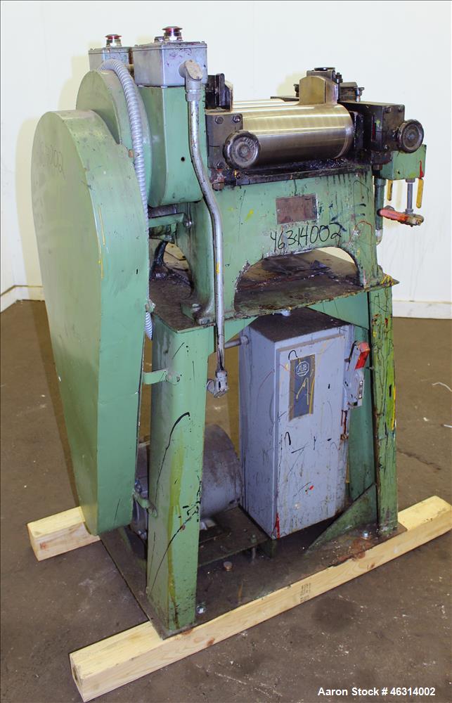 Used J.H. Day Horizontal Three Roll Lab Dispersion Mill, Model 5" x 12". (3) 5" Diameter x 12" wide carbon steel cored rolls. (2) Adjustable copper edge guides, bottom drip pan, knife scraper with di...