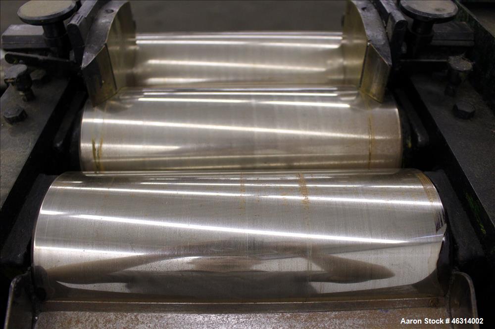 Used J.H. Day Horizontal Three Roll Lab Dispersion Mill, Model 5" x 12". (3) 5" Diameter x 12" wide carbon steel cored rolls. (2) Adjustable copper edge guides, bottom drip pan, knife scraper with di...