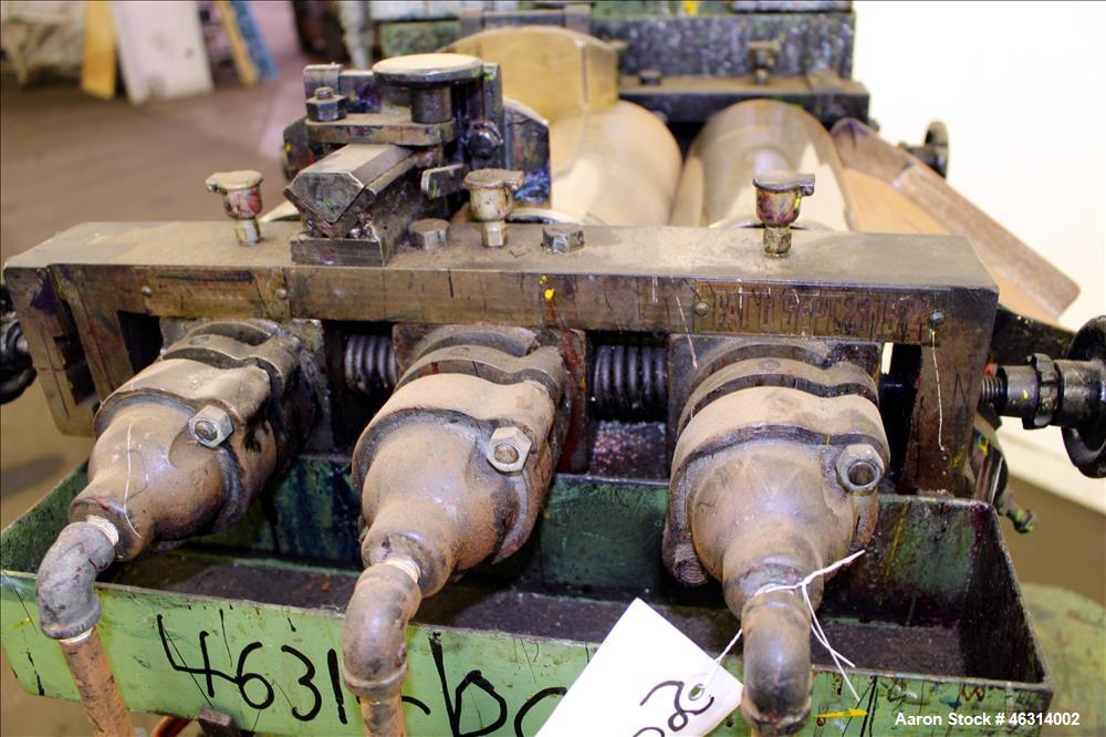 Used J.H. Day Horizontal Three Roll Lab Dispersion Mill, Model 5" x 12". (3) 5" Diameter x 12" wide carbon steel cored rolls. (2) Adjustable copper edge guides, bottom drip pan, knife scraper with di...