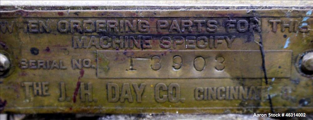 Used J.H. Day Horizontal Three Roll Lab Dispersion Mill, Model 5" x 12". (3) 5" Diameter x 12" wide carbon steel cored rolls. (2) Adjustable copper edge guides, bottom drip pan, knife scraper with di...
