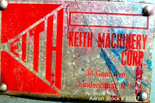 Used Keith Machinery Horizontal Three Roll Mill, model 4 x 8. (3) 4" diameter x 8" wide cored rolls. Adjustable end guides, knife scraper with discharge pan, bottom drip pan. Driven by an approximate...
