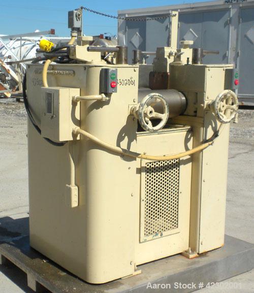 Used Kent Machine Works Horizontal Three Roll Mill, model 6 x 14, carbon steel. (3) 6" diameter x 14" wide cored rolls. Adjustable brass end guides, knife scraper with discharge pan, bottom drip pan....