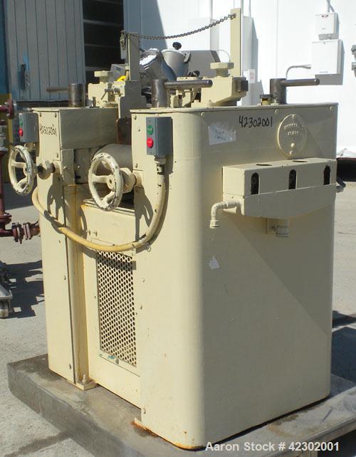 Used Kent Machine Works Horizontal Three Roll Mill, model 6 x 14, carbon steel. (3) 6" diameter x 14" wide cored rolls. Adjustable brass end guides, knife scraper with discharge pan, bottom drip pan....