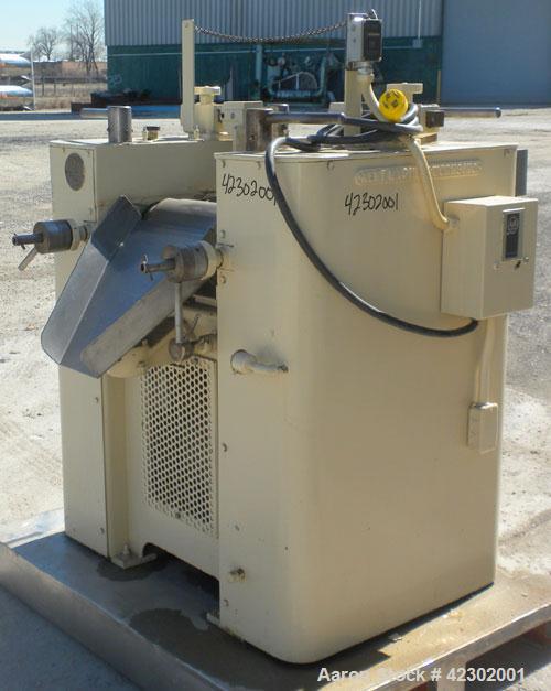 Used Kent Machine Works Horizontal Three Roll Mill, model 6 x 14, carbon steel. (3) 6" diameter x 14" wide cored rolls. Adjustable brass end guides, knife scraper with discharge pan, bottom drip pan....