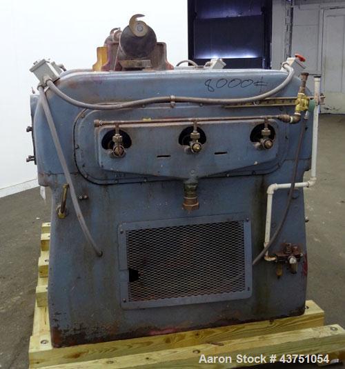 Used Lehmann Horizontal Three Roll Mill, Model 13X32. (3) 13" Diameter x 32" wide chrome plated adjustable cored rolls. Adjustable brass edge guides, knife scraper with discharge pan, bottom drip pan...