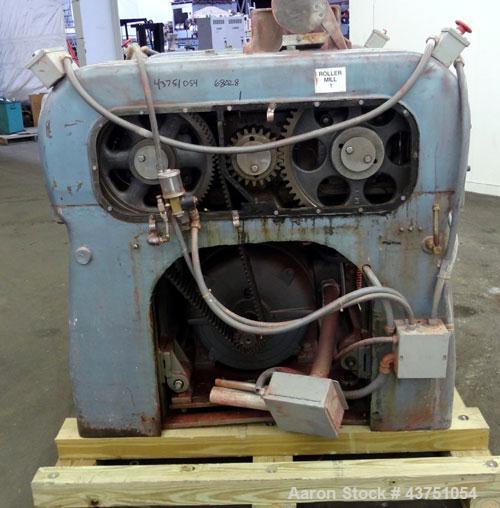 Used Lehmann Horizontal Three Roll Mill, Model 13X32. (3) 13" Diameter x 32" wide chrome plated adjustable cored rolls. Adjustable brass edge guides, knife scraper with discharge pan, bottom drip pan...