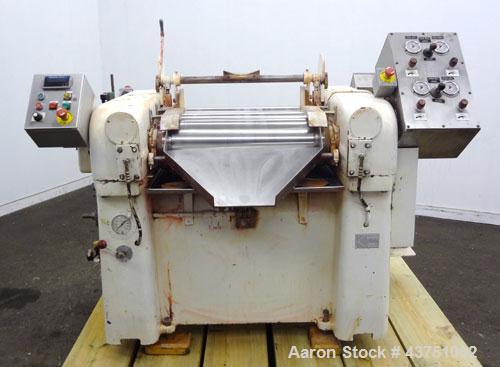 Used Lehmann Horizontal Three Roll Mill, Model 663-V. (3) 9" Diameter x 24" wide Bi-Metal cast iron adjustable cored rolls. Adjustable brass edge guides, knife scraper with discharge pan, bottom drip...