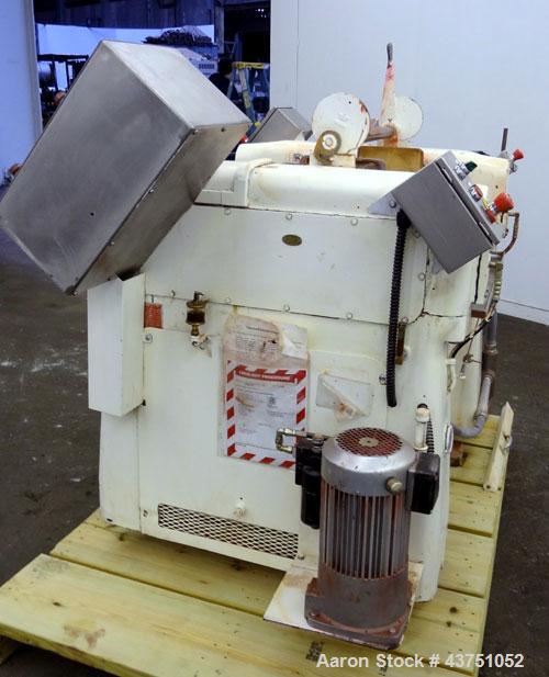 Used Lehmann Horizontal Three Roll Mill, Model 663-V. (3) 9" Diameter x 24" wide Bi-Metal cast iron adjustable cored rolls. Adjustable brass edge guides, knife scraper with discharge pan, bottom drip...