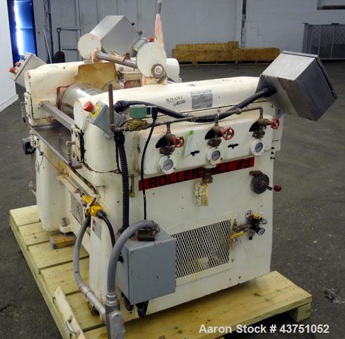 Used Lehmann Horizontal Three Roll Mill, Model 663-V. (3) 9" Diameter x 24" wide Bi-Metal cast iron adjustable cored rolls. Adjustable brass edge guides, knife scraper with discharge pan, bottom drip...