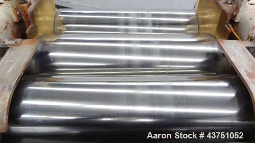 Used Lehmann Horizontal Three Roll Mill, Model 663-V. (3) 9" Diameter x 24" wide Bi-Metal cast iron adjustable cored rolls. Adjustable brass edge guides, knife scraper with discharge pan, bottom drip...